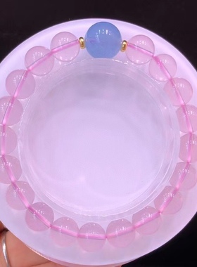 天然莫桑比克星光粉手串搭配海蓝宝珠子。规格9.5mm。重：23.5克