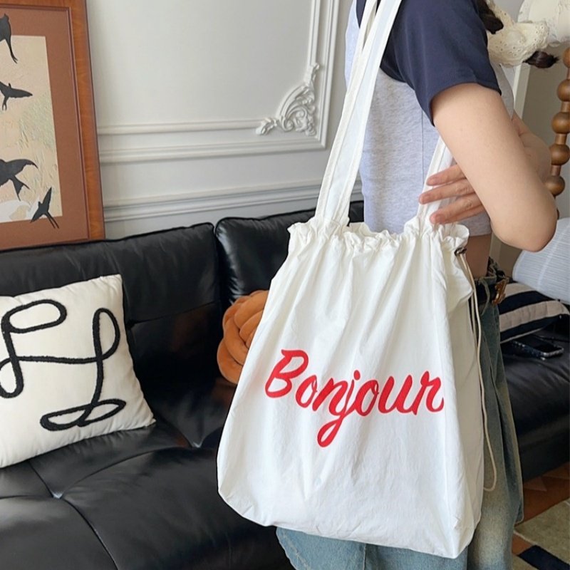 2025夏季新抽绳帆布包ins日系托特包上班通勤手提袋大容量单肩包,淘宝优惠券,粉丝福利购,淘宝优惠卷