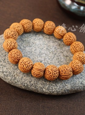 原籽无相奶酪猴头龙纹桃核手串