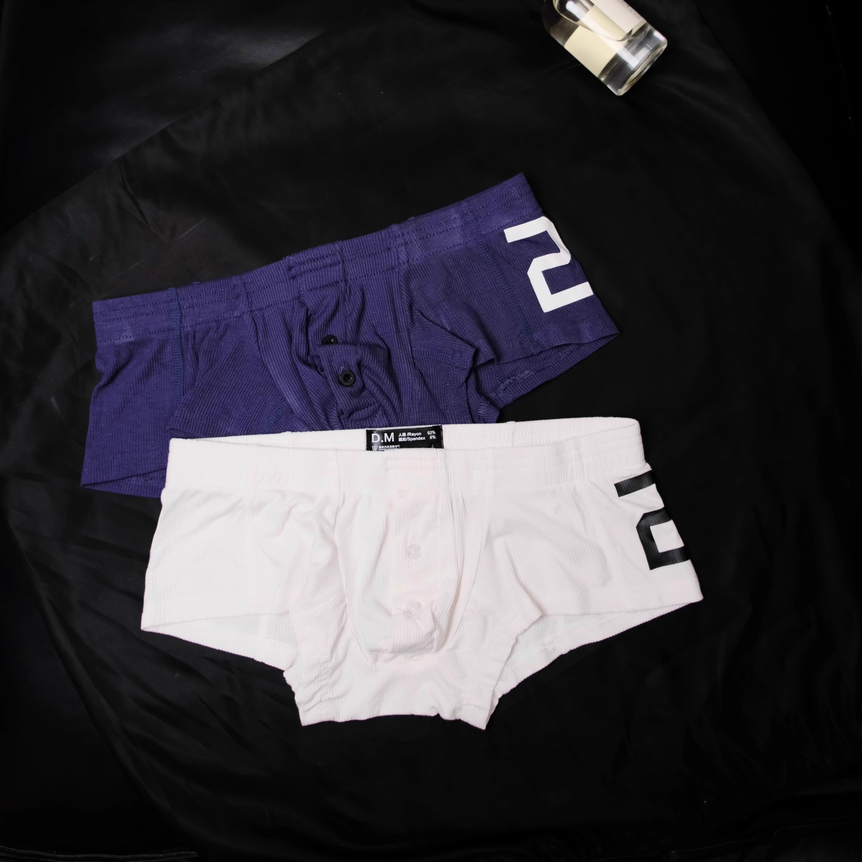 D.M男内裤 性感纯色四角裤纽扣激凸囊袋字母20螺纹莫代尔人棉平角 - 图1