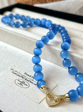 小众设计高级感人造猫眼蓝色串珠钻扣项链气质独特打结显白锁骨链