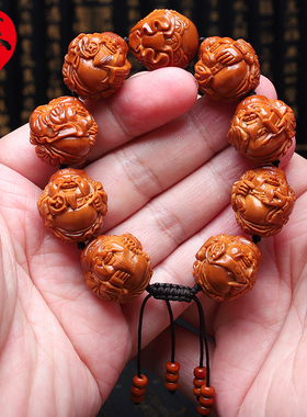 苏家男女橄榄核手工核雕