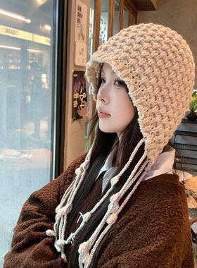 时尚手工编织流苏球球毛线帽子女保暖护耳绑带针织帽大头围套头帽