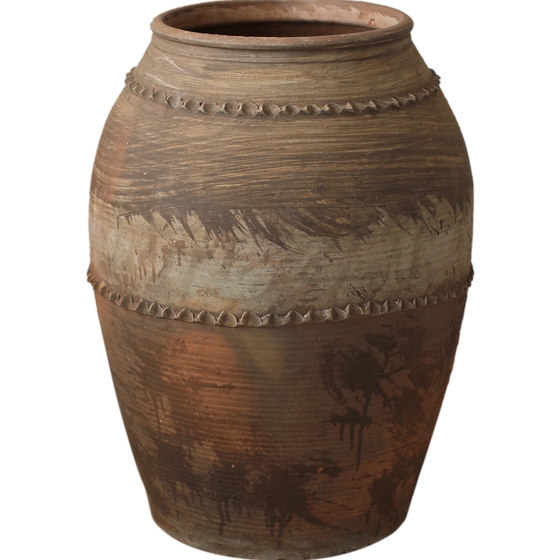 Traditional craftsmanship of old large clay pot vase with texture and large mouth