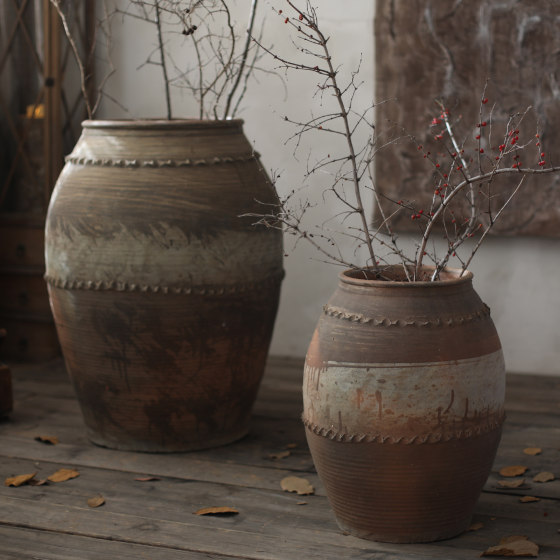 Traditional craftsmanship of old large clay pot vase with texture and large mouth
