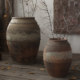 Traditional craftsmanship of old large clay pot vase with texture and large mouth