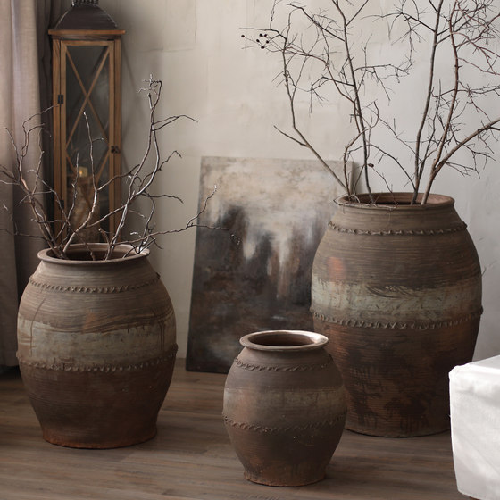 Traditional craftsmanship of old large clay pot vase with texture and large mouth