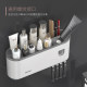 Toothbrush rack with built-in toothpaste dispenser and mouthwash cup