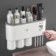 Lazy automatic toothpaste squeezer toothbrush storage rack