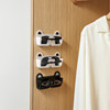 Wall-mounted glasses storage rack without punching holes and no damage to the wall