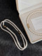 Shijiao white magnetic buckle pearl necklace women's 2026 new clavicle chain light luxury temperament cheongsam neck chain accessories