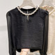2025 ຮູບແບບຝຣັ່ງໃຫມ່ 2025 Round Neck Beaded Hollow Solid Color Pullover Long Sleeve Shirt Women's Autumn Thin Top