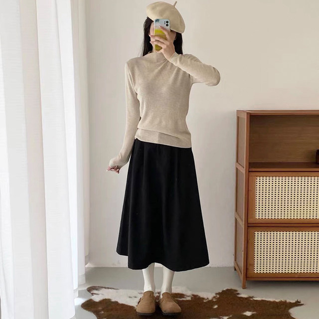 Crotch-covering A-line skirt for petites with pressed pleats and drapey umbrella skirt