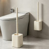 Wall-mounted long-handled toilet brush with no holes and no dead ends