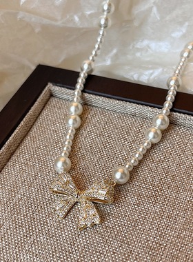 蝴蝶结吊坠珍珠项链女款2025年新款高级感轻奢小众锁骨链颈链配饰