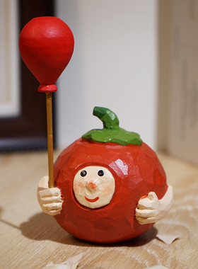 手工木雕番茄娃娃举气球