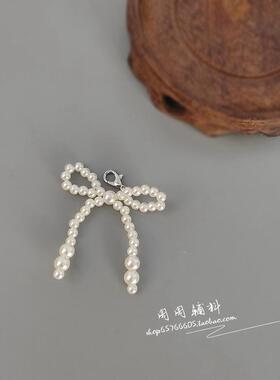 白色仿珍珠蝴蝶结饰品