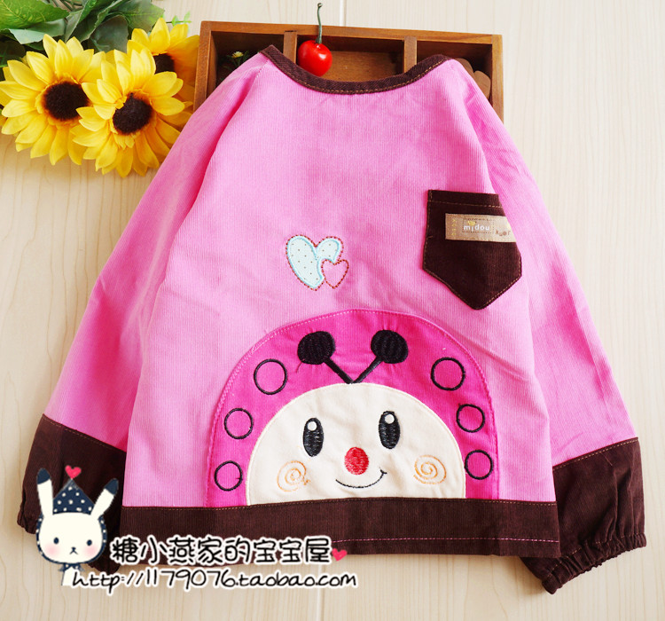 Pure cotton waterproof corduroy apron for baby girls wearing backwards