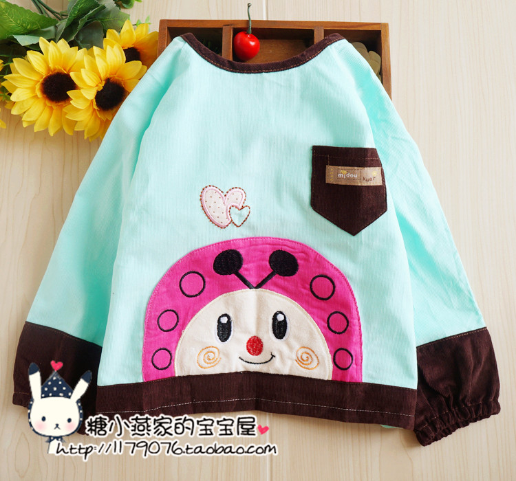 Pure cotton waterproof corduroy apron for baby girls wearing backwards