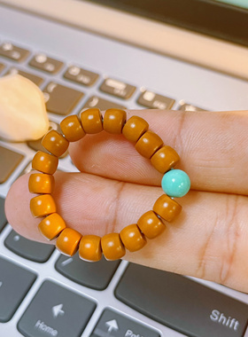 橄榄核尖国产材质复古指尖文玩药片 迷你型小手捻百香把玩把件