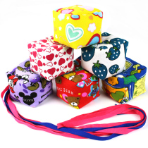 Special adults throwing small sandbag sports class kicks with rope sandbag children lost sandbag nursery school children