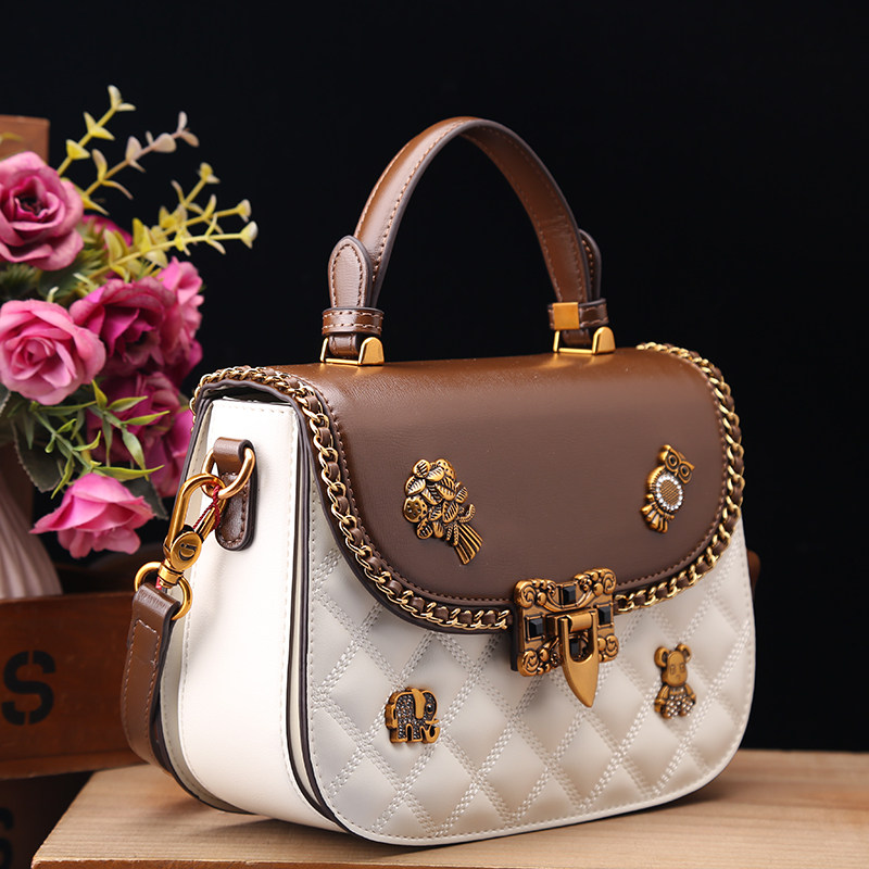 古萨驰正品真皮女包2025新款时尚徽章百搭休闲菱格单肩斜挎小圆包,淘宝优惠券,粉丝福利购,淘宝优惠卷