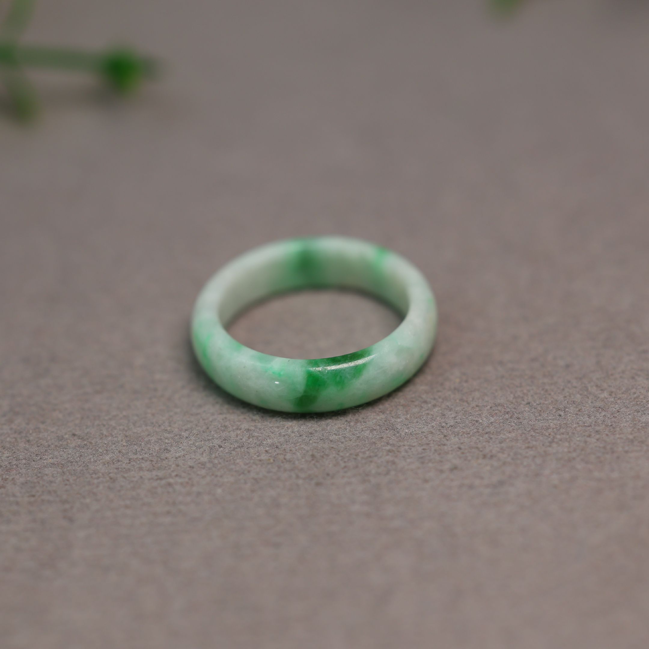Floating Yang Green Natural Grade A Jadeite Ring on White Background