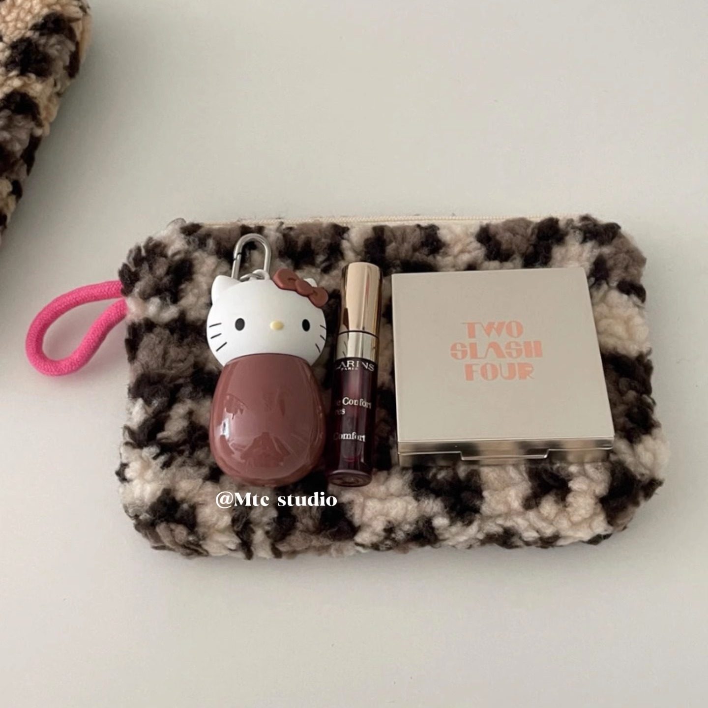 韩系ins小众设计可爱牛奶纹毛绒豹纹化妆包零钱包学生手拿包收纳,淘宝优惠券,粉丝福利购,淘宝优惠卷