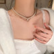 Miss Charlotte's elegant double-sided zirconium pearl necklace