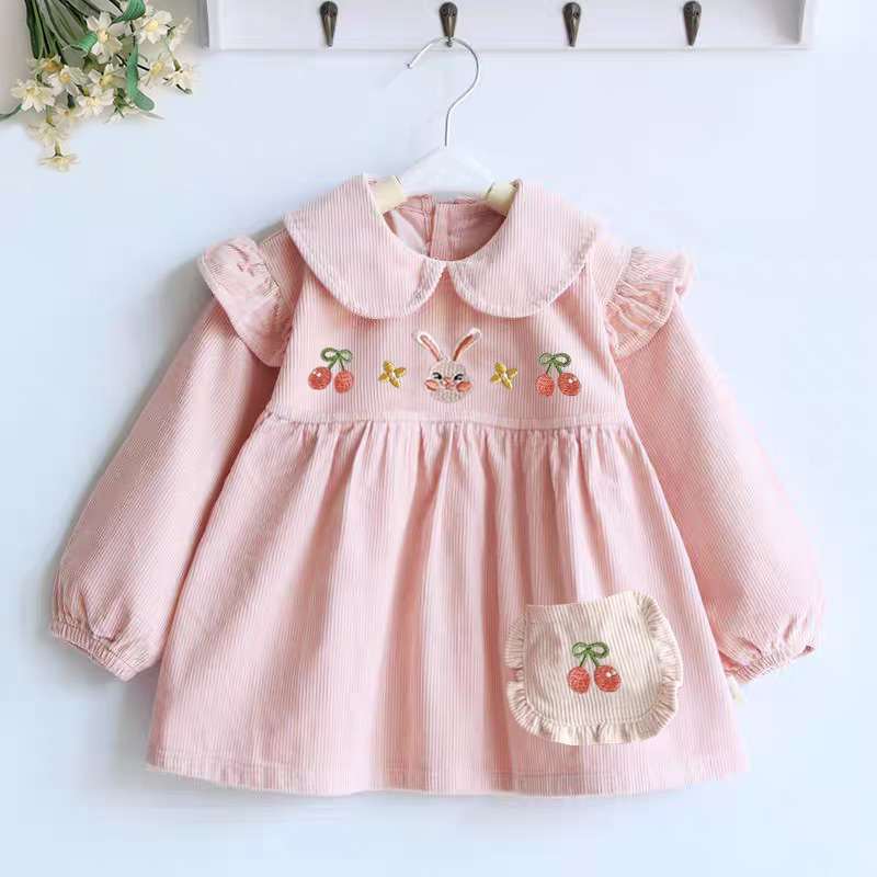 Baby girl's smock with princess skirt and bib