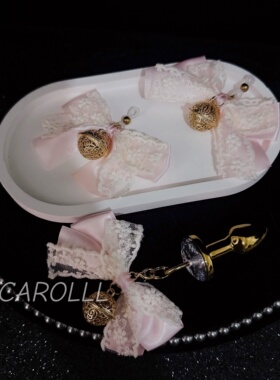 CAROLLL粉红蕾丝蝴蝶结r环链条小铃铛