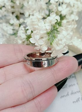 日韩新款热销戒指女钛钢情侣对戒可转动满天星婚戒食指指环女首饰