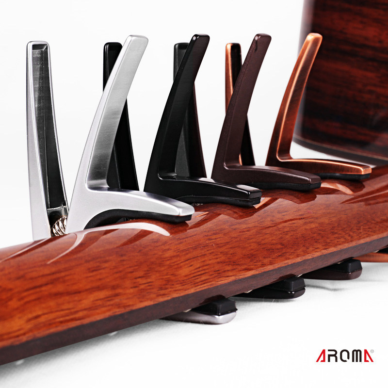 阿诺玛吉他变调夹 AC01 AC21金属电木古典民谣移调变音夹子Capo,淘宝优惠券,粉丝福利购,淘宝优惠卷