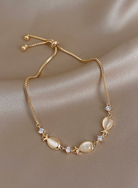 猫眼石小鱼串珠手链女高级感轻奢精致手串气质小众复古抽拉手饰品