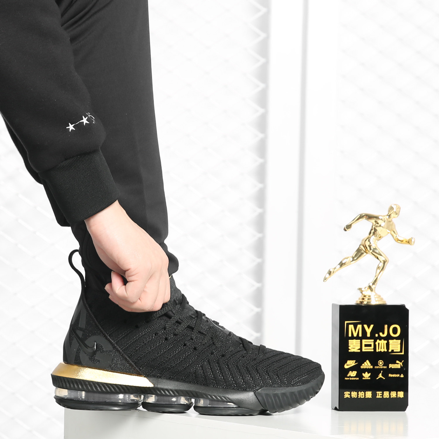 lebron james black and gold shoes