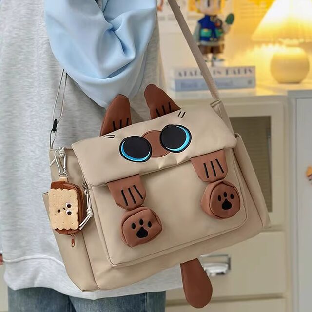 Cute cartoon cat schoolbag female junior high school student niche design small backpack female college student high school student crossbody bag