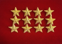 Old fashioned metal solid star shoulder ornaments 12 slightly blemishes mind dont shoot oh