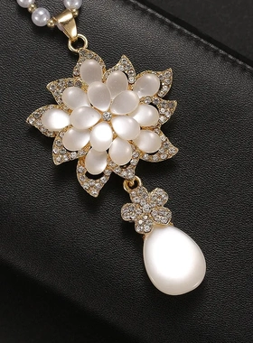 韩版百搭时尚花朵毛衣链秋冬配饰长款项链女高级感猫眼毛衣链吊坠