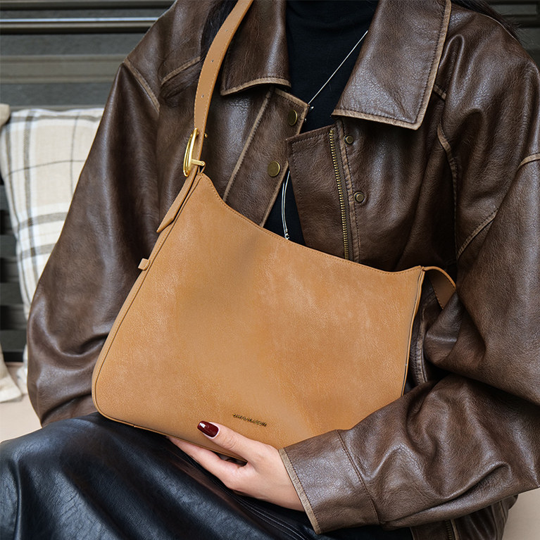 欧米omi水桶包2026新款女通勤包包大容量托特包真皮可斜挎单肩包,淘宝优惠券,粉丝福利购,淘宝优惠卷