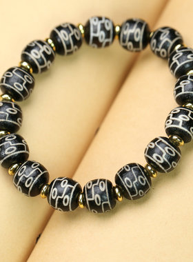 天然藏传黑玛瑙九眼天珠单圈手串