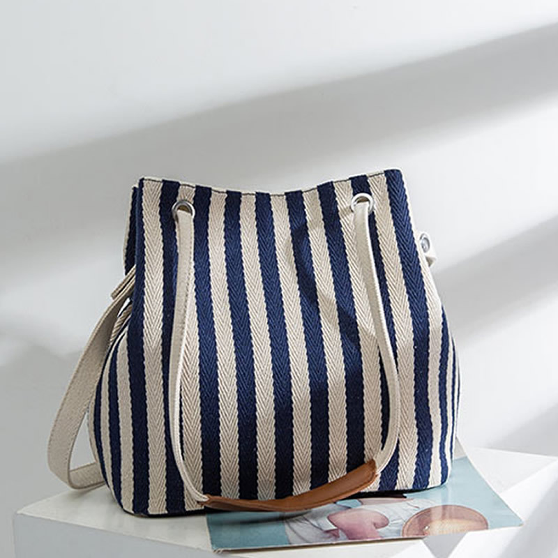 新款帆布条纹斜跨多用包韩版水桶包 小清家便当包店女士包袋