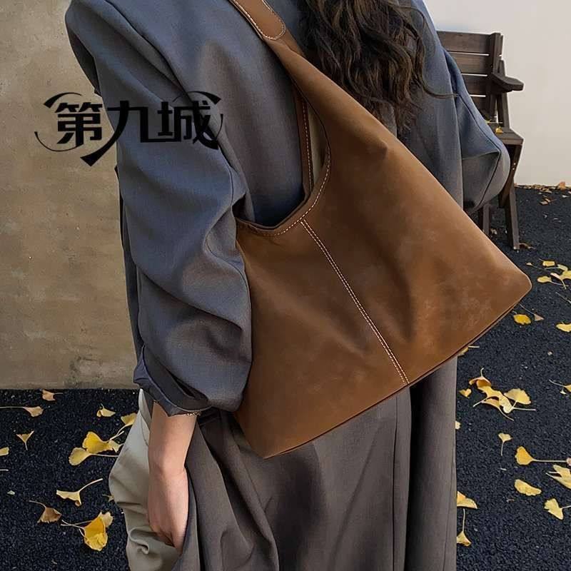 第九城休闲个性托特包2025冬季新款女士包包潮流质感大容量单肩包,淘宝优惠券,粉丝福利购,淘宝优惠卷