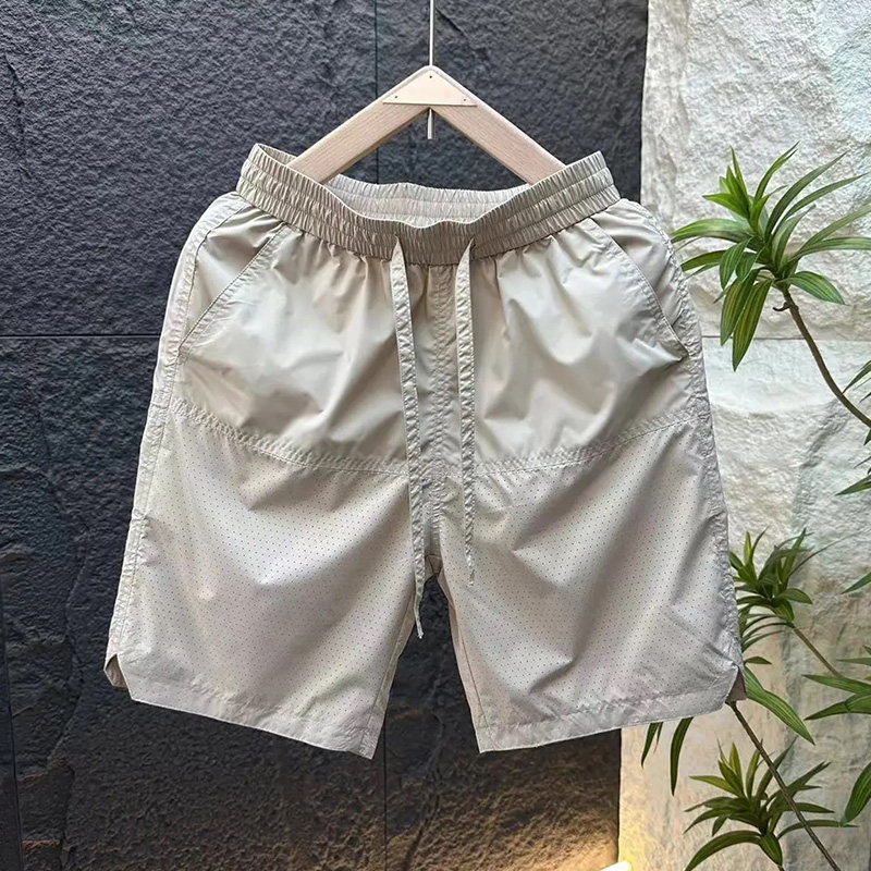 夏季薄款潮牌速干短裤男士青少年宽松百搭激光打孔透气冰丝五分裤,淘宝优惠券,粉丝福利购,淘宝优惠卷