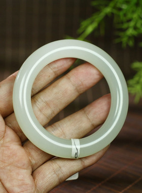 古晨和田玉冰晴水圆条手镯