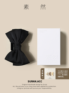 黑色蝴蝶结抓夹布艺、亚克力时尚
