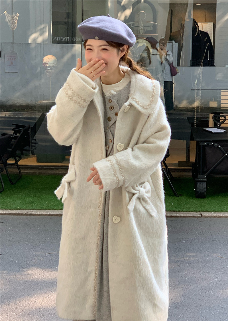 蛋包饭餐厅 米白色爱心扣中长款大衣 10.31 新品95折上架,淘宝优惠券,粉丝福利购,淘宝优惠卷