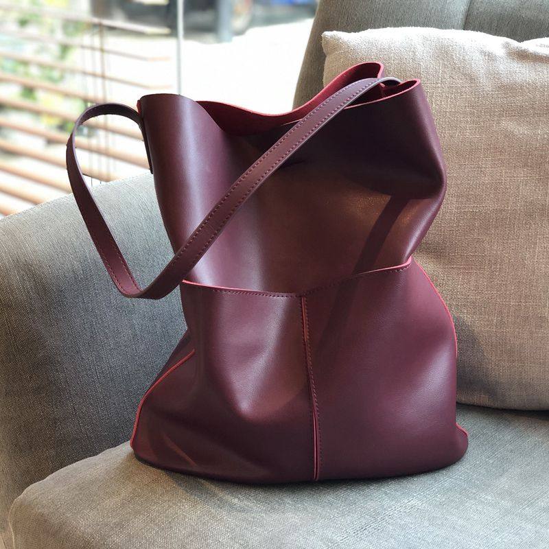 菲色如华新款气质牛皮女休闲水桶包 菲色如华女士包袋