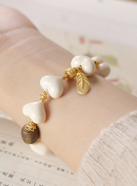 新中式猛犸象牙手串女款爱心牙牙