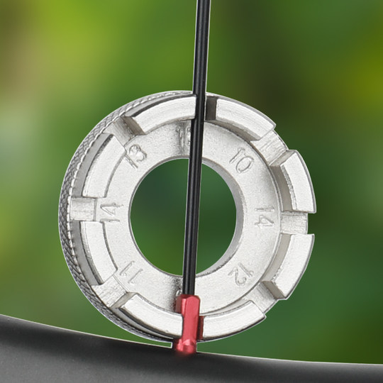 Spoke wrench correction tool ring adjustment