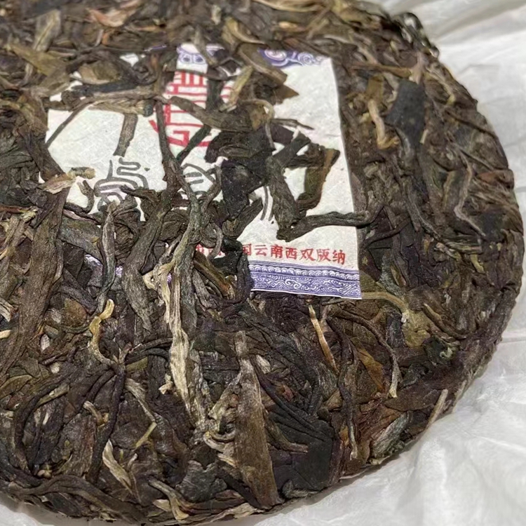 云南七子饼茶生茶2022年兴海乌金号西双版纳普洱茶生普357g礼品茶